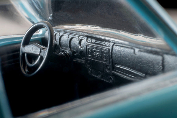 Tomica Limited Vintage 1969 Datsun 510 2-Door Sedan US Spec in Light Blue, detailed 1:64 die-cast model.