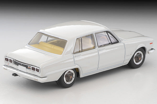 Tomica Limited Vintage 1972 Nissan Skyline 2000 GT-X four-door sedan in White, detailed Hakosuka 1:64 model.