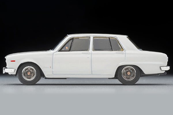 Tomica Limited Vintage 1972 Nissan Skyline 2000 GT-X four-door sedan in White, detailed Hakosuka 1:64 model.