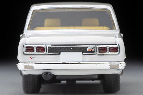Tomica Limited Vintage 1972 Nissan Skyline 2000 GT-X four-door sedan in White, detailed Hakosuka 1:64 model.