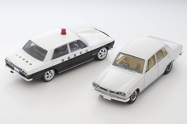 Tomica Limited Vintage 1972 Nissan Skyline 2000 GT-X four-door sedan in White, detailed Hakosuka 1:64 model.