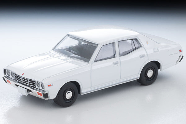 Tomica Limited Vintage 1978 Nissan Cedric Standard four-door sedan in White, detailed 330-series 1:64 model.