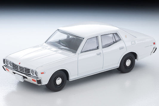 Tomica Limited Vintage 1978 Nissan Cedric Standard four-door sedan in White, detailed 330-series 1:64 model.