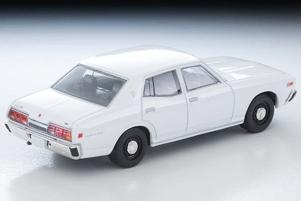 Tomica Limited Vintage 1978 Nissan Cedric Standard four-door sedan in White, detailed 330-series 1:64 model.