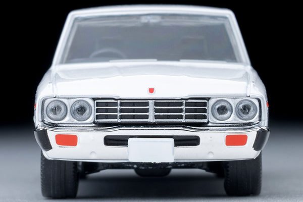 Tomica Limited Vintage 1978 Nissan Cedric Standard four-door sedan in White, detailed 330-series 1:64 model.