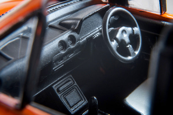 Tomica Limited Vintage NEO 1984 Honda City Cabriolet in orange, 1:64 scale with detailed open body and interior
