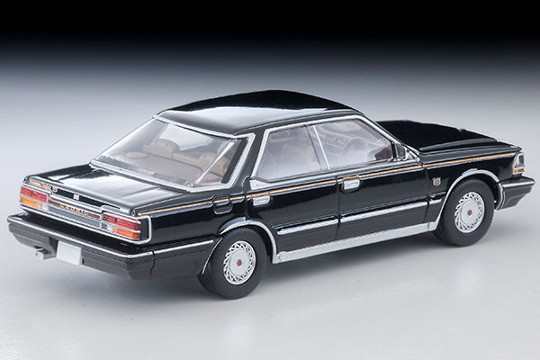 Tomica Limited Vintage 1985 Nissan Cedric V30 Turbo Brougham VIP in Black with gold VIP stripe and new wheels.