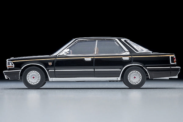 Tomica Limited Vintage 1985 Nissan Cedric V30 Turbo Brougham VIP in Black with gold VIP stripe and new wheels.
