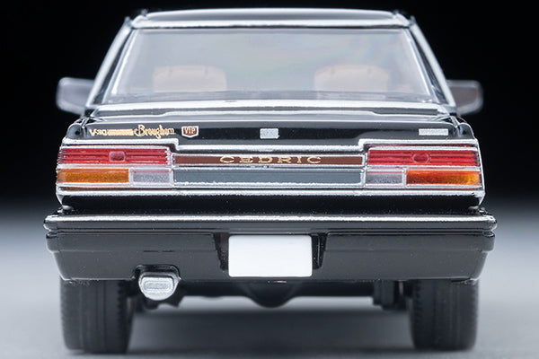 Tomica Limited Vintage 1985 Nissan Cedric V30 Turbo Brougham VIP in Black with gold VIP stripe and new wheels.