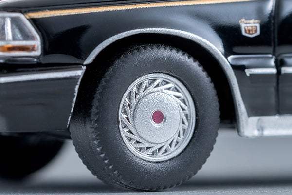 Tomica Limited Vintage 1985 Nissan Cedric V30 Turbo Brougham VIP in Black with gold VIP stripe and new wheels.