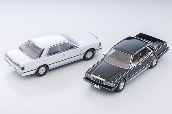 Tomica Limited Vintage 1985 Nissan Cedric V30 Turbo Brougham VIP in Black with gold VIP stripe and new wheels.