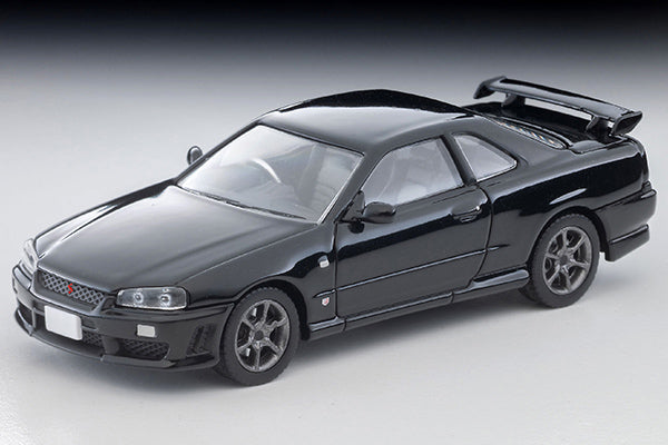 Tomica Limited Vintage 2000 Nissan Skyline 25GT Turbo ER34 in Black with interchangeable exterior parts and rear spoiler options.