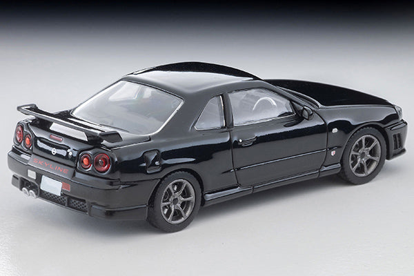 Tomica Limited Vintage 2000 Nissan Skyline 25GT Turbo ER34 in Black with interchangeable exterior parts and rear spoiler options.