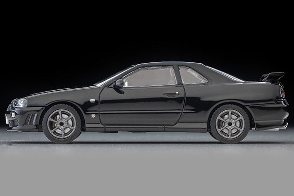 Tomica Limited Vintage 2000 Nissan Skyline 25GT Turbo ER34 in Black with interchangeable exterior parts and rear spoiler options.