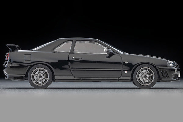 Tomica Limited Vintage 2000 Nissan Skyline 25GT Turbo ER34 in Black with interchangeable exterior parts and rear spoiler options.