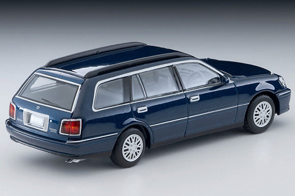 Tomica Limited Vintage 2000 Toyota Crown Estate Royal Saloon in navy blue with detailed front grille and headlights.