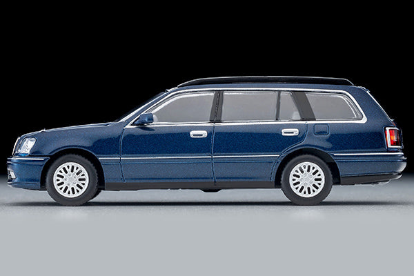 Tomica Limited Vintage 2000 Toyota Crown Estate Royal Saloon in navy blue with detailed front grille and headlights.