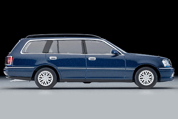 Tomica Limited Vintage 2000 Toyota Crown Estate Royal Saloon in navy blue with detailed front grille and headlights.