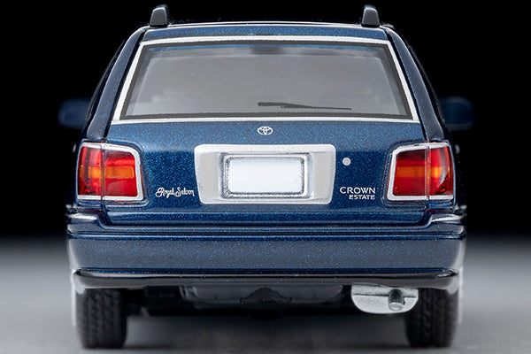 Tomica Limited Vintage 2000 Toyota Crown Estate Royal Saloon in navy blue with detailed front grille and headlights.