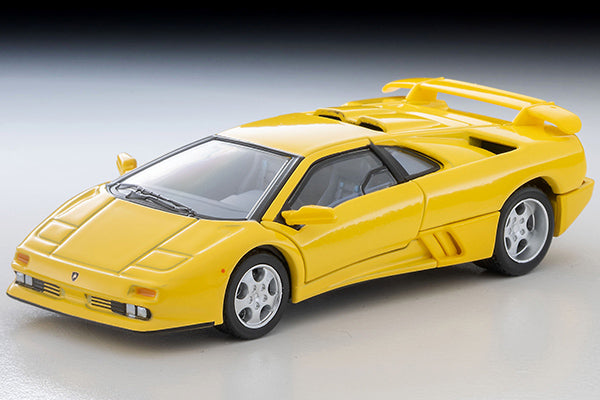 Tomica Limited Vintage Lamborghini Diablo SE30 Jota in yellow with opening scissor doors.