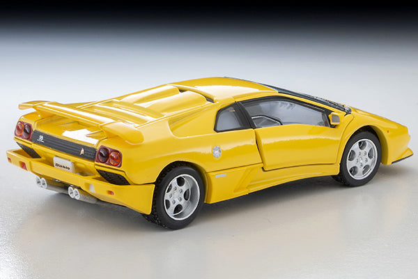 Tomica Limited Vintage Lamborghini Diablo SE30 Jota in yellow with opening scissor doors.