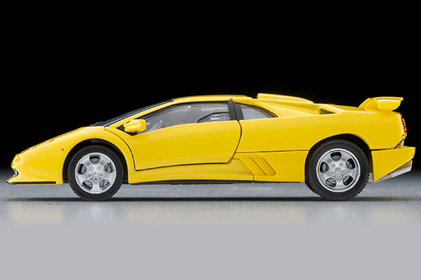 Tomica Limited Vintage Lamborghini Diablo SE30 Jota in yellow with opening scissor doors.
