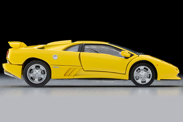 Tomica Limited Vintage Lamborghini Diablo SE30 Jota in yellow with opening scissor doors.