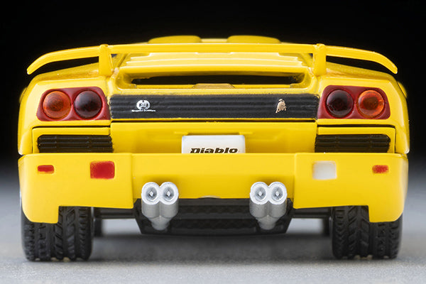 Tomica Limited Vintage Lamborghini Diablo SE30 Jota in yellow with opening scissor doors.