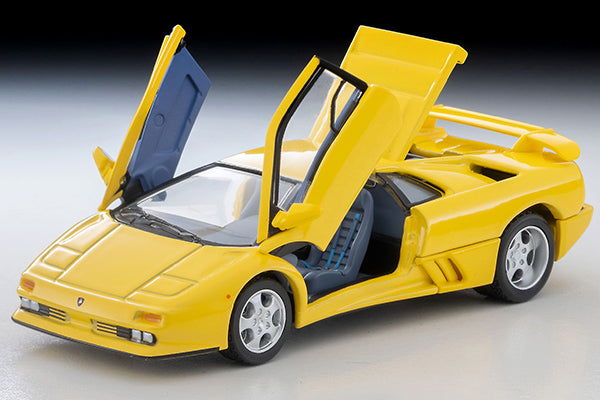 Tomica Limited Vintage Lamborghini Diablo SE30 Jota in yellow with opening scissor doors.