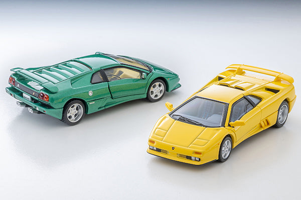Tomica Limited Vintage Lamborghini Diablo SE30 Jota in yellow with opening scissor doors.