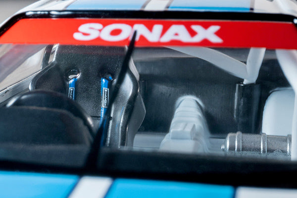Tomica Limited Vintage Nissan Skyline 1993 FET Sports GT-R Group A race car with opening hood and detailed engine.