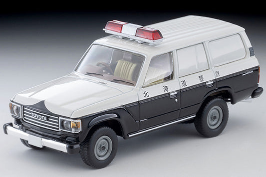 Tomica Limited Vintage Toyota Land Cruiser 60 Hokkaido Police patrol car with round headlights, red light and covered side windows.