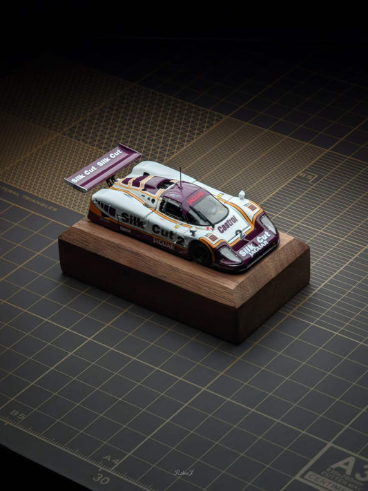 Transcend 1:64 Jaguar XJR-9 Le Mans Group C race car with magnetic front and rear covers showing detailed interior.