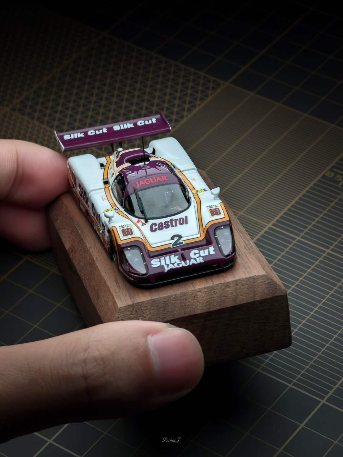 Transcend 1:64 Jaguar XJR-9 Le Mans Group C race car with magnetic front and rear covers showing detailed interior.