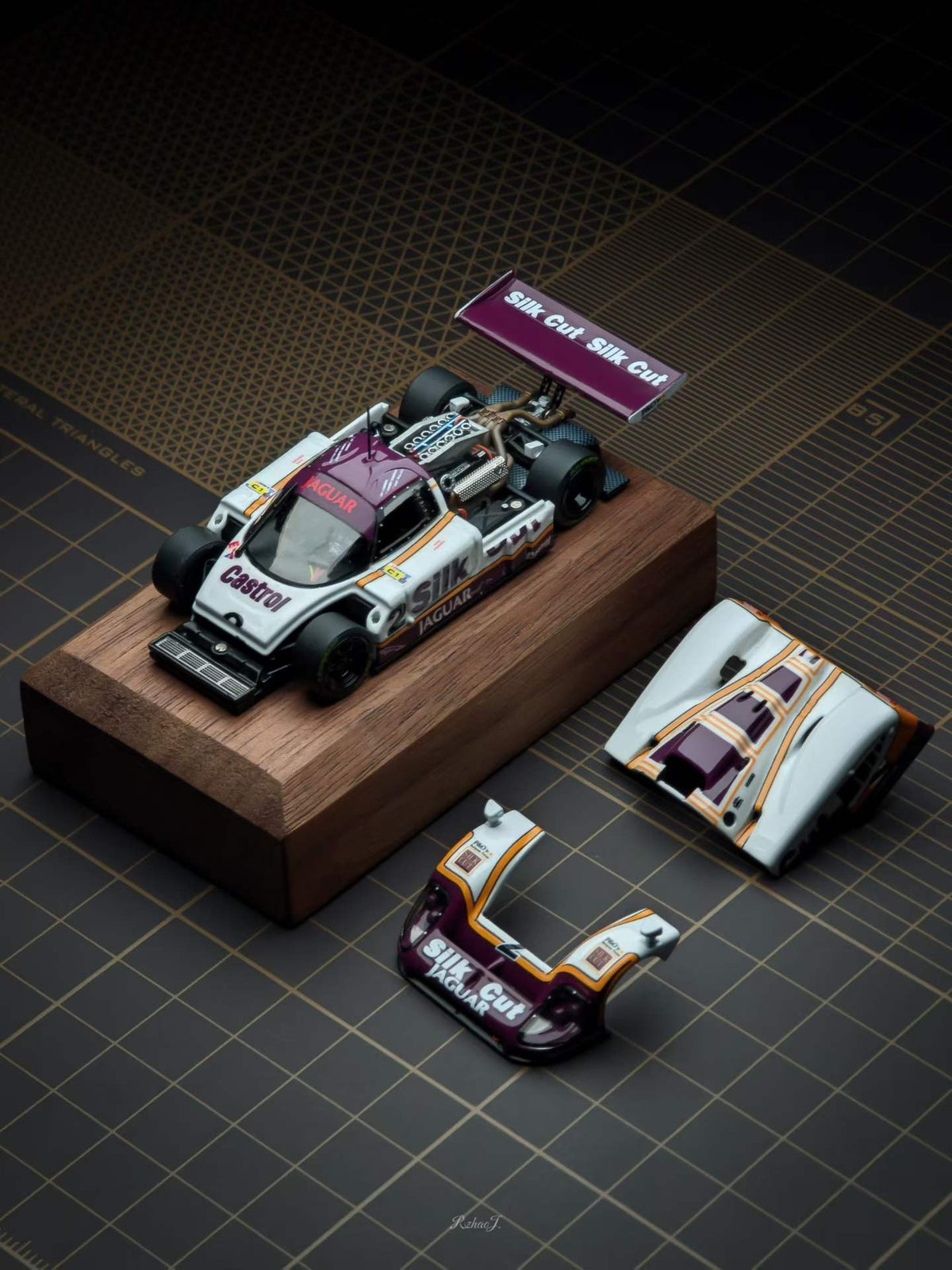 Transcend 1:64 Jaguar XJR-9 Le Mans Group C race car with magnetic front and rear covers showing detailed interior.