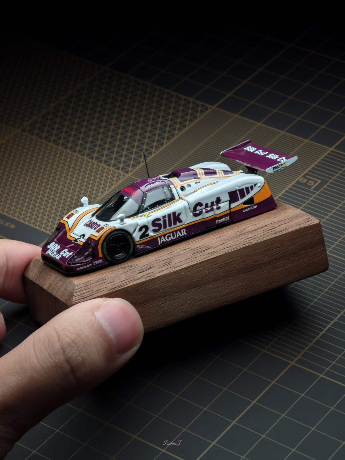 Transcend 1:64 Jaguar XJR-9 Le Mans Group C race car with magnetic front and rear covers showing detailed interior.