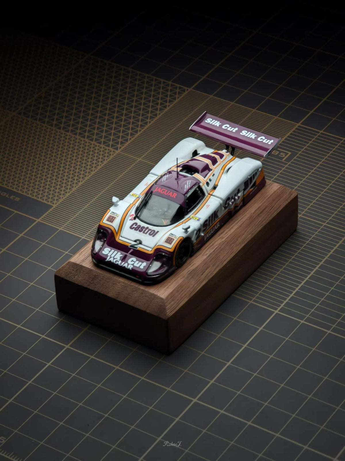 Transcend 1:64 Jaguar XJR-9 Le Mans Group C race car with magnetic front and rear covers showing detailed interior.